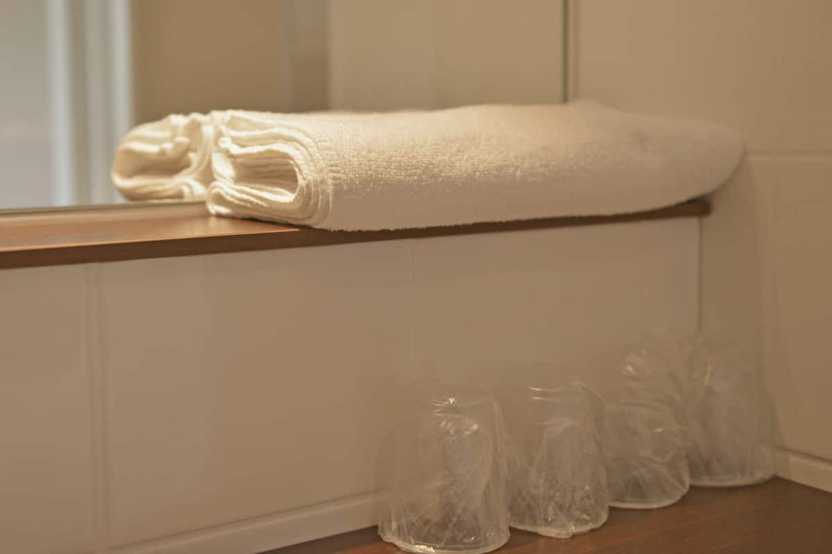 shower, eco-friendly toiletries, towels