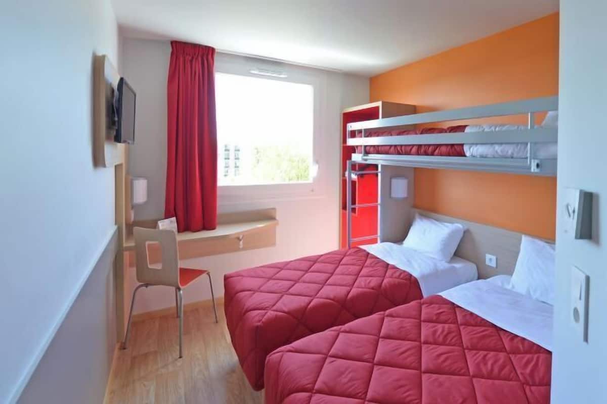 Premium bedding, individually furnished, desk, laptop workspace