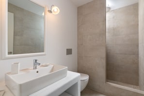 Akti Luxury Suites | Bathroom | Shower, rainfall showerhead, designer toiletries, hair dryer