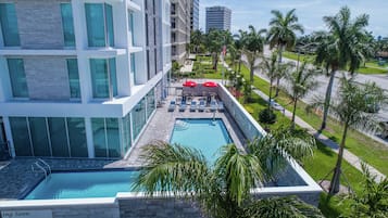 Outdoor pool, pool umbrellas, pool loungers