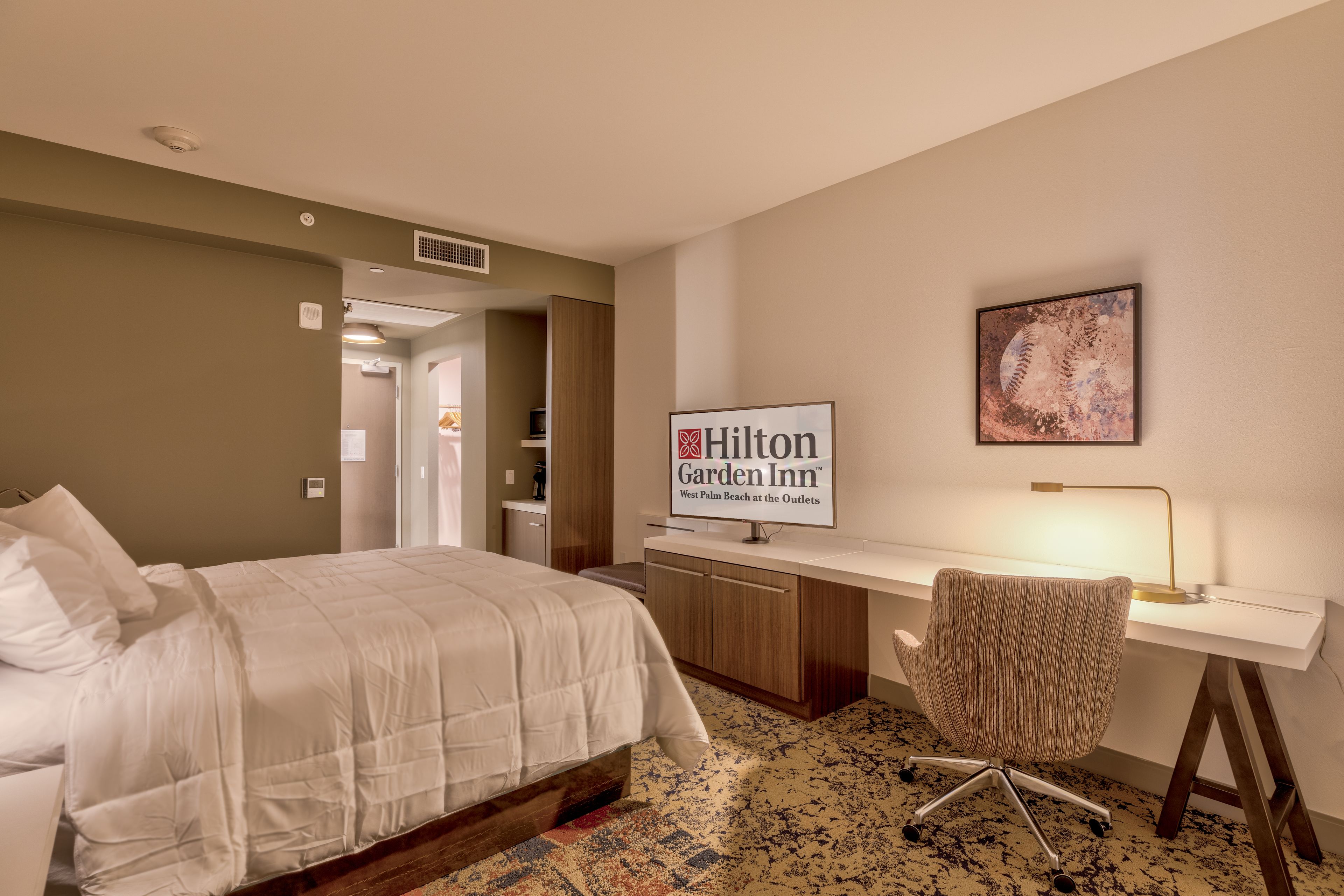 room, 1 king bed, accessible (roll-in shower, mobility & hearing) | in-room safe, desk, laptop workspace, blackout curtains