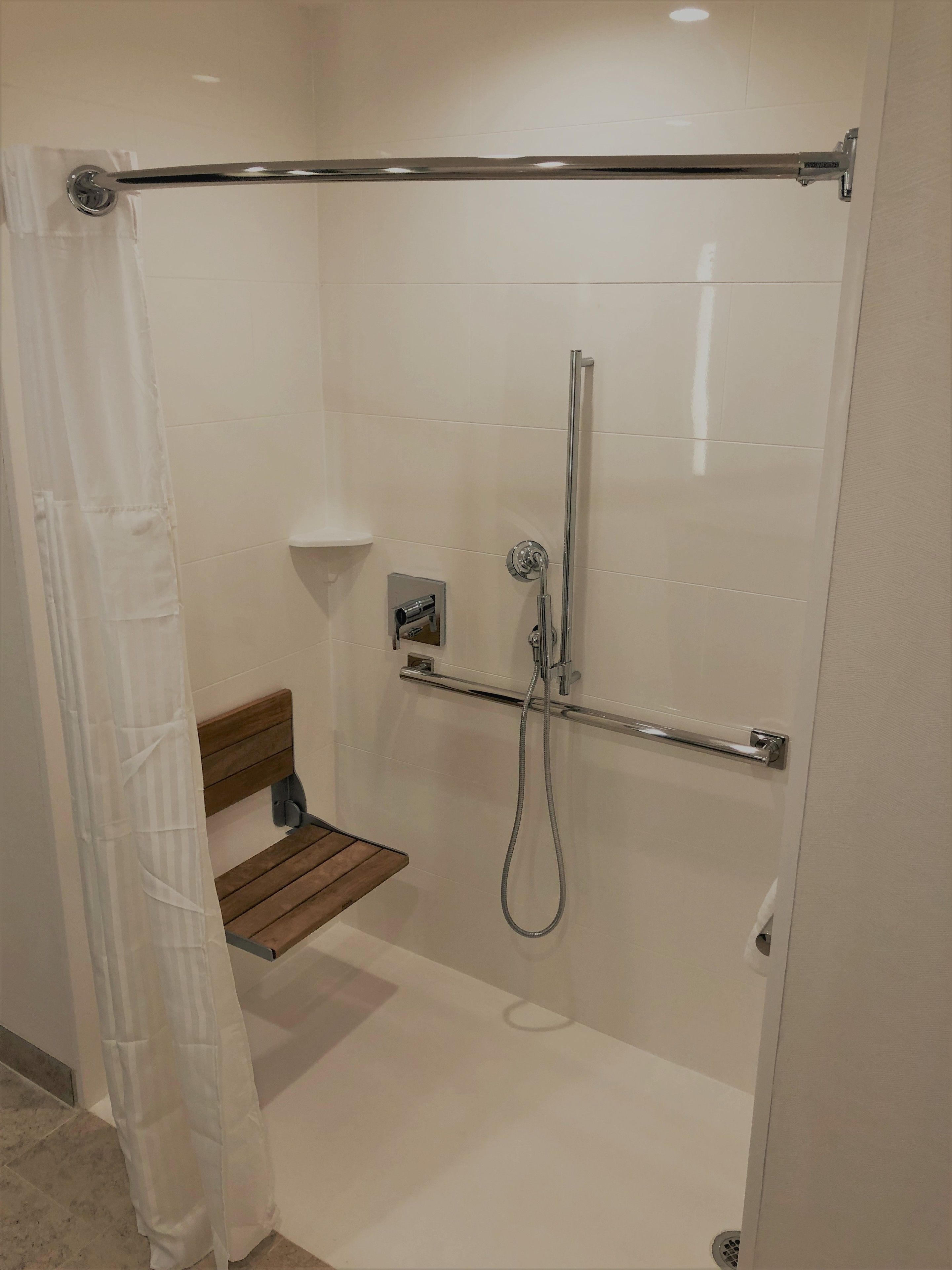 deep-soaking bathtub, rainfall showerhead, free toiletries, hair dryer
