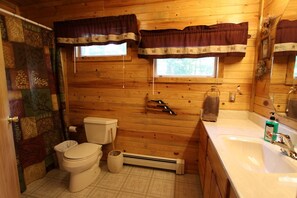 Combined shower/tub, hair dryer, towels, soap
