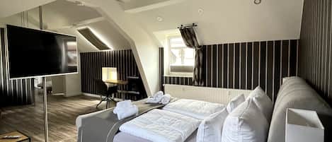 Comfort Quadruple Room | 1 bedroom, free minibar, desk, laptop workspace