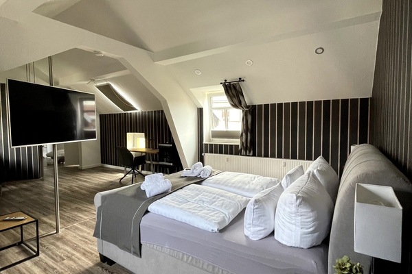 Comfort Quadruple Room | Free minibar, desk, laptop workspace, blackout drapes