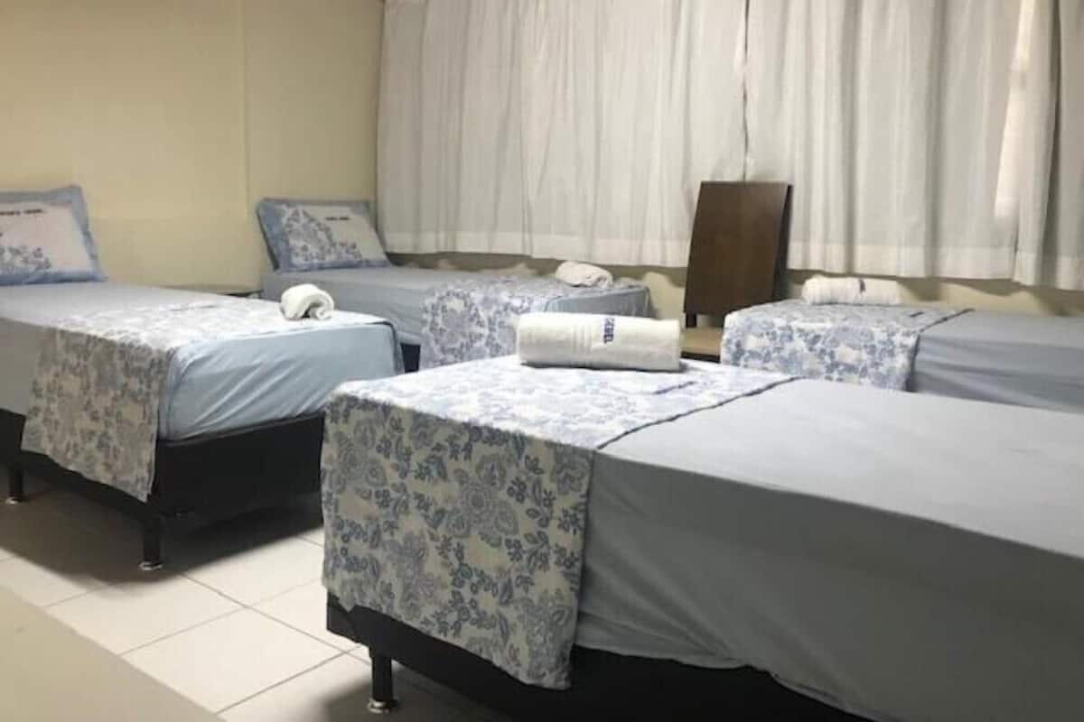 Blackout drapes, free WiFi, bed sheets