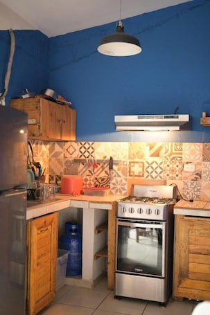 Deluxe House, 1 King Bed | Private kitchen | Full-size fridge, oven, stovetop, cookware/dishes/utensils