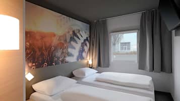 Desk, blackout curtains, soundproofing, free WiFi