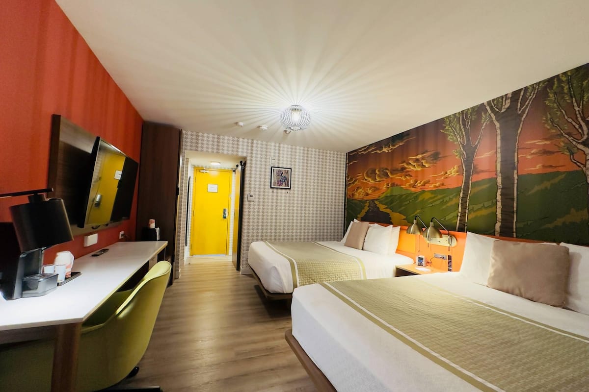 Standard Room, 2 Queen Beds, Non Smoking | In-room safe, individually decorated, individually furnished, desk