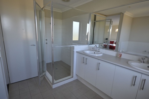 Bathtub, hair dryer, towels, soap