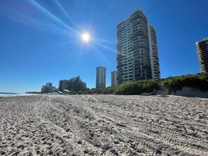 On the beach, sun-loungers, beach towels