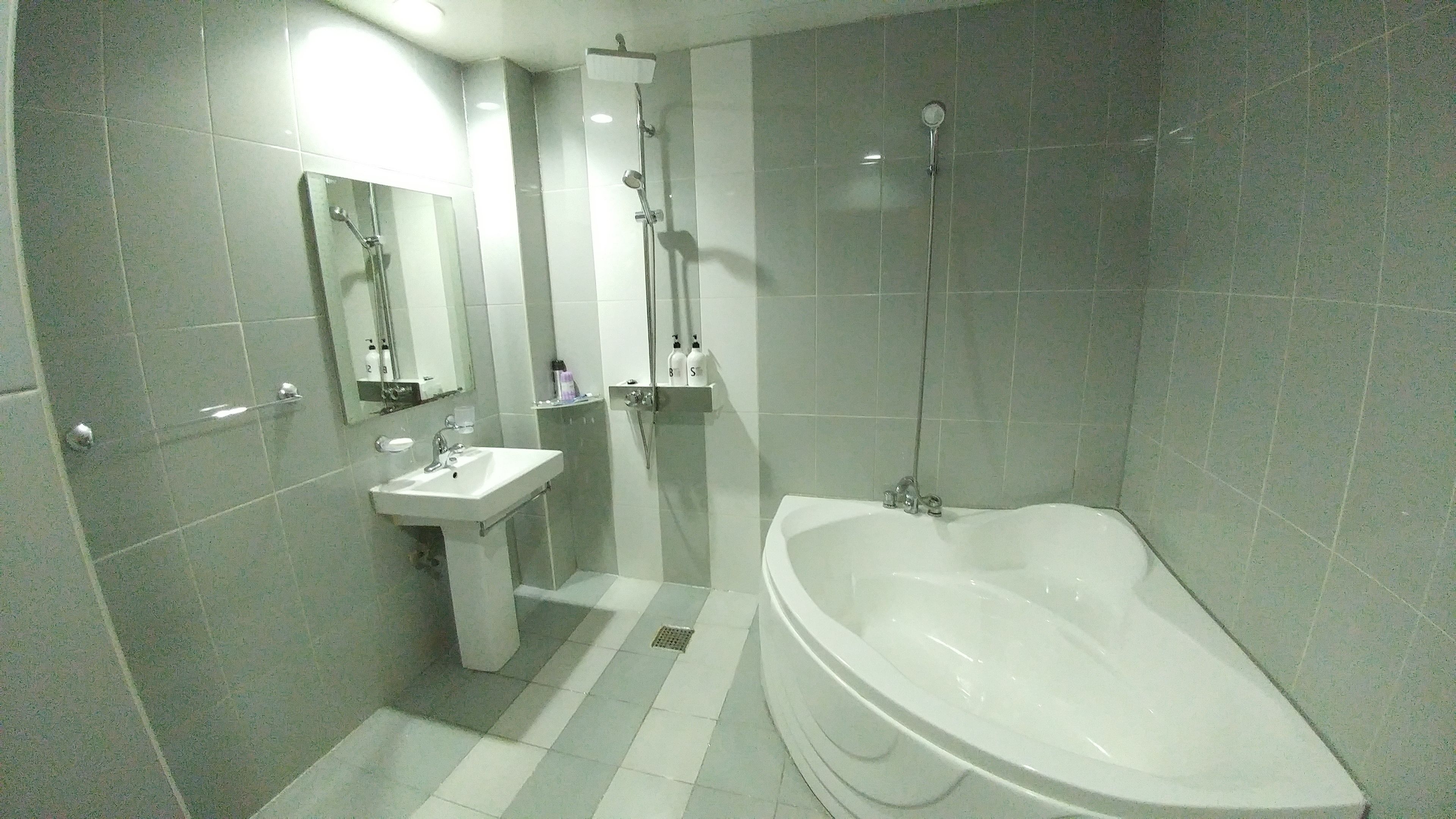 premier room, multiple beds | bathroom | separate bathtub and shower, free toiletries, hair dryer, slippers