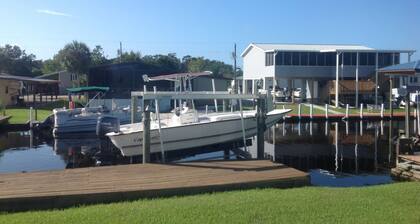 Located on the Homosassa River. Min. from the Gulf. Dock space for large boats.