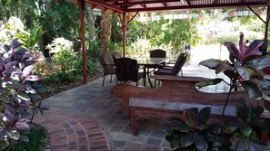 Outdoor dining - Shambhala Retreat Cottages a peaceful place intended for rest and relaxation. (Nelly Bay)