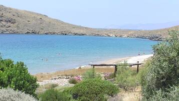 Na praia, toalhas de praia