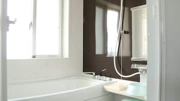 Separate tub and shower, deep soaking tub, free toiletries, hair dryer