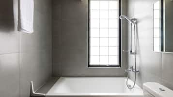 Combined shower/tub, hair dryer, towels, soap