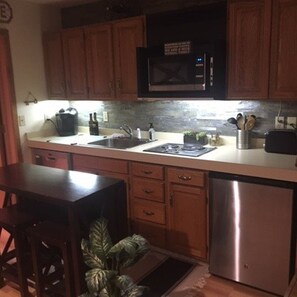 Private kitchen - Popular condo located at Schuss Mountain. (Mancelona)