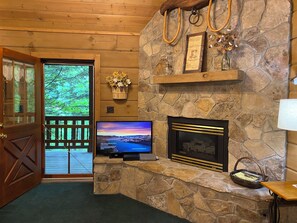 Smart TV, fireplace, DVD player, books