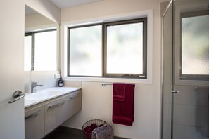 Bathtub, hair dryer, towels, soap