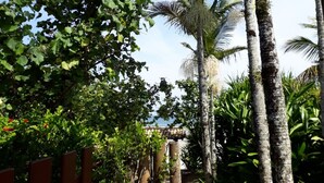 A pathway leading to a covered area with a sign reading "ALDETA".