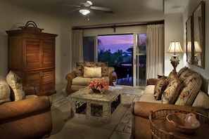 Living Room With Balcony Golf and Ocean View