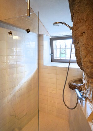 Shower, hair dryer, towels, soap