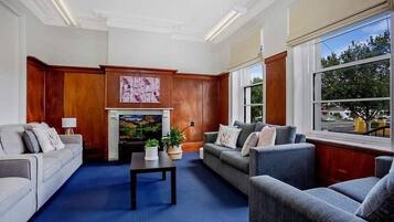 Family Townhome, 4 Bedrooms, 2 Bathrooms | Living room | Flat-screen TV