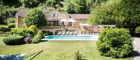 Outdoor pool, a heated pool, pool loungers