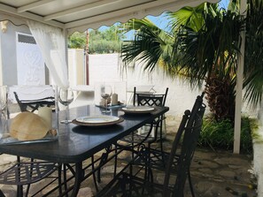 Outdoor dining - Mermaid' house close to beach , two suite bedroom sea view for 6 people  (Taormina Letojanni)