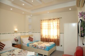 Habitación triple Deluxe | Escritorio y wifi gratis 
