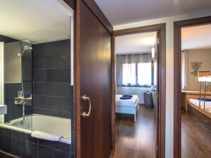 Bathtub, hair dryer, towels