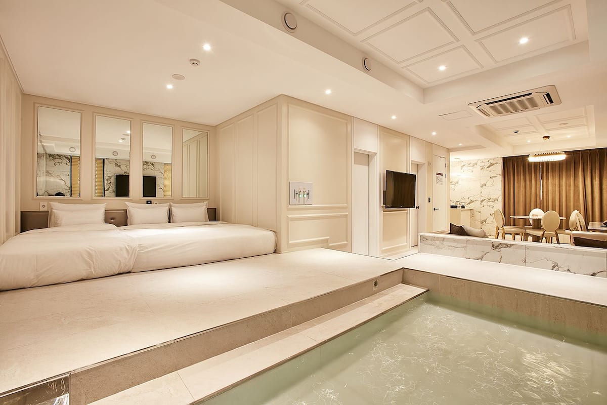 wanted suite | living area | flat-screen tv