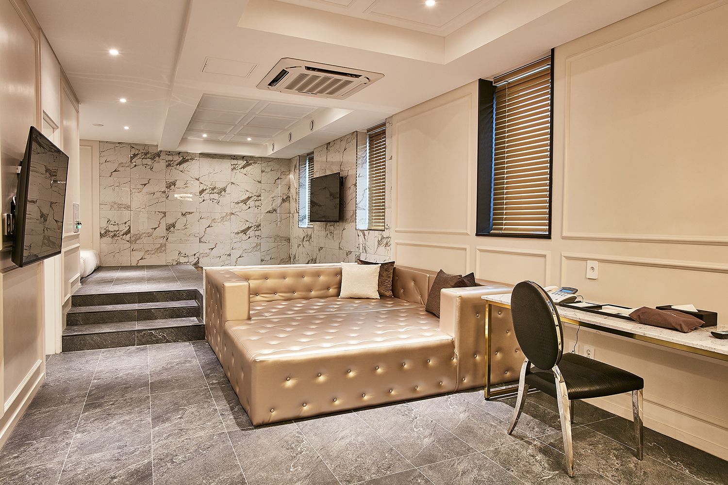 wanted suite | living area | flat-screen tv