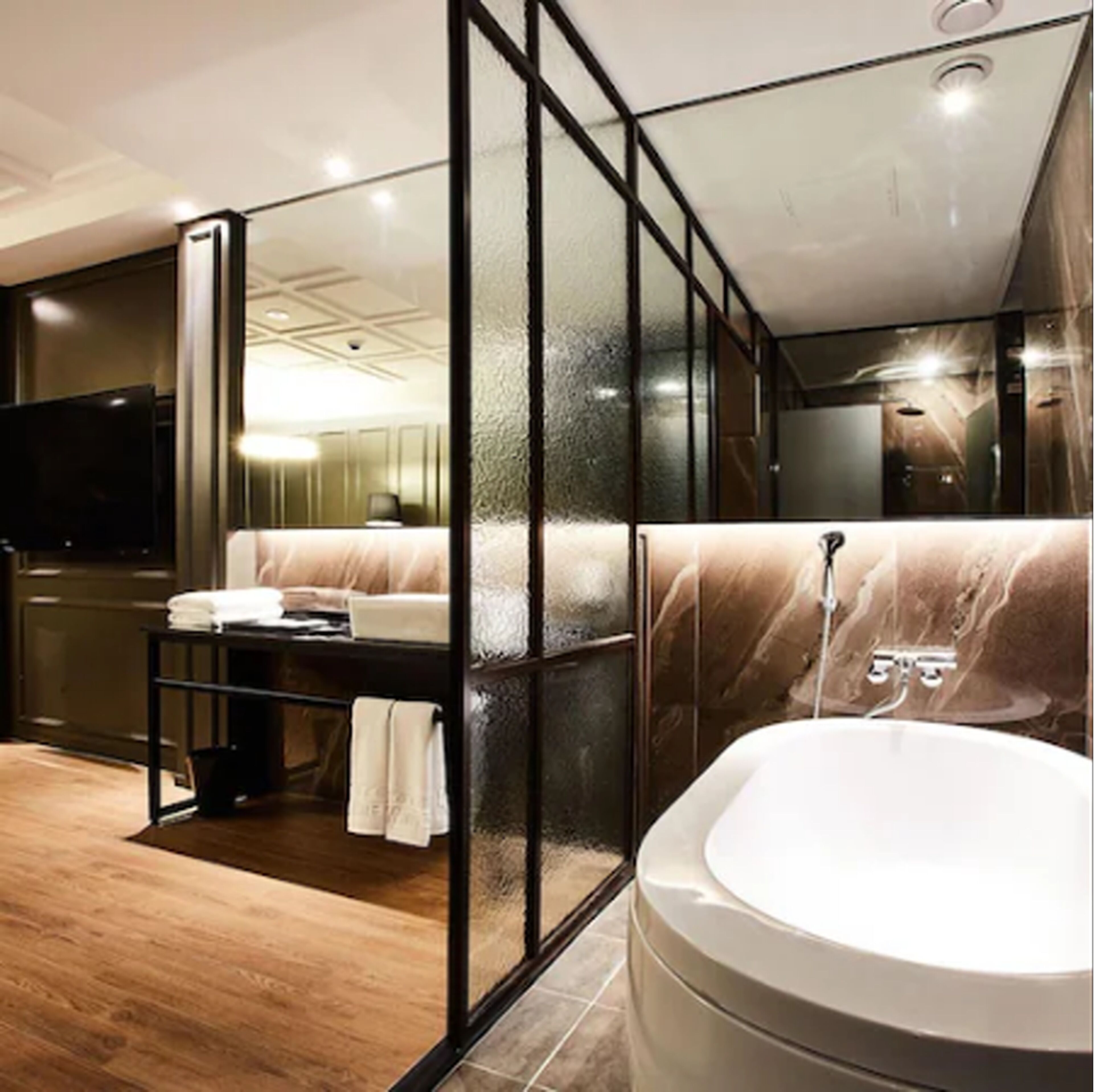 deluxe double room (black) | bathroom | separate bathtub and shower, deep-soaking bathtub, free toiletries