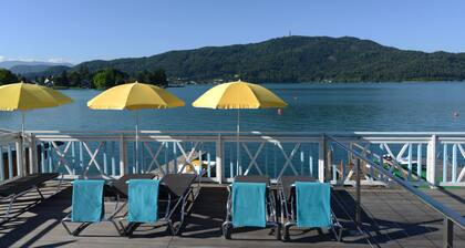 Maison de vacances avec plage de baignade au bord du lac de Wörthersee, 2 - 7 personnes, sortie avec un animal de compagnie