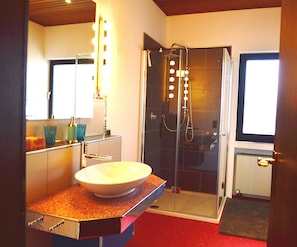 Bathtub, hair dryer, towels, soap