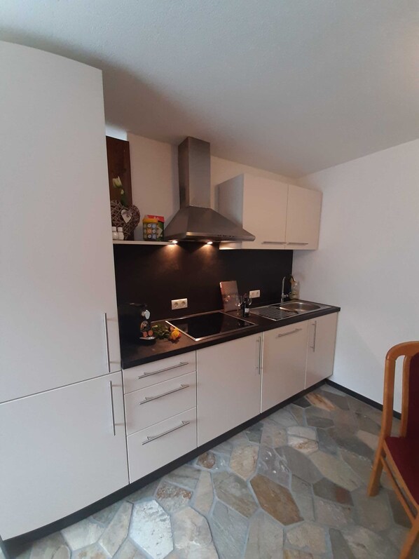 Fridge, microwave, dishwasher, high chair