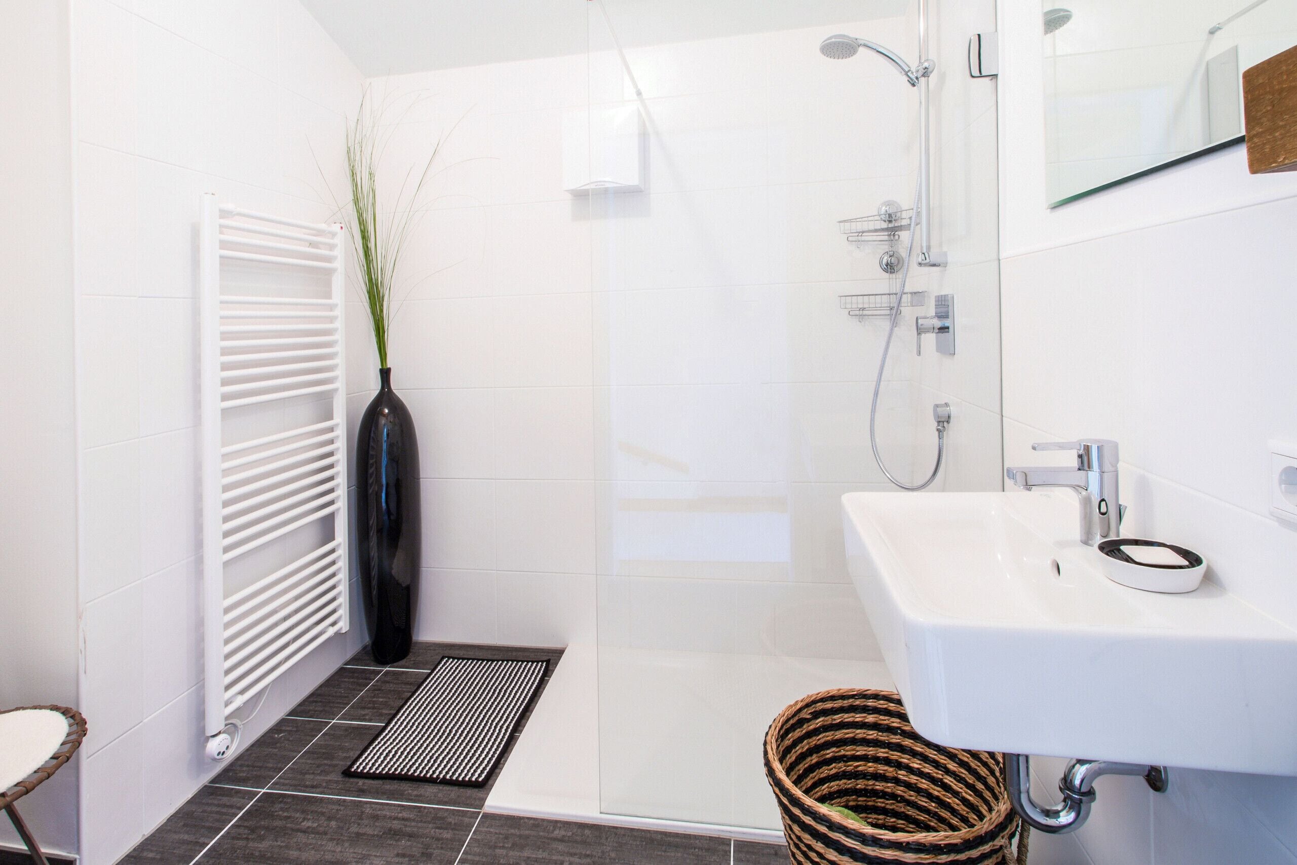 Bathtub, hair dryer, towels, soap