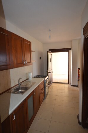 Apartment, 1 Schlafzimmer | Eigene Kochnische | Kühlschrank, Herdplatte, Kochgeschirr/Geschirr/Besteck