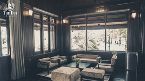 Bungalow de lujo, 1 cama de matrimonio, vistas al complejo turístico | Sala de estar