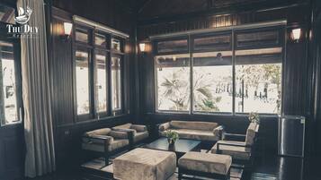 Luxury Bungalow, 1 Queen Bed, Resort View | Living room | 32-inch flat-screen TV with cable channels, TV