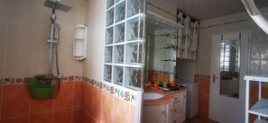 Shower, hair dryer, towels, soap