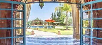 Villa Dar MOUDAR Marrakech large pool and garden with authentic architecture