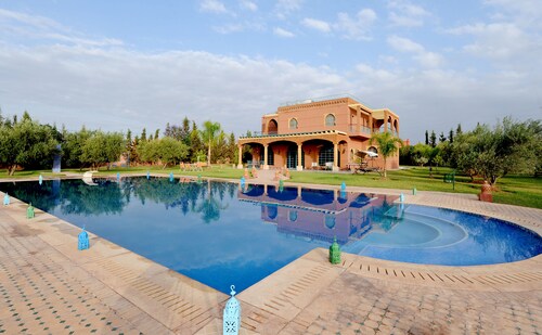 Villa Dar MOUDAR Marrakech large pool and garden with authentic architecture