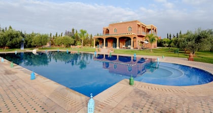 Villa Dar MOUDAR Marrakech large pool and garden with authentic architecture