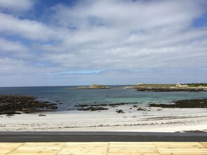 On the beach, sun-loungers