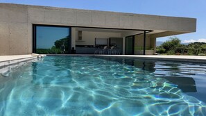 A heated pool, pool loungers - Luxurious architect-designed house, 4 bedrooms, heated pool  (Oletta)