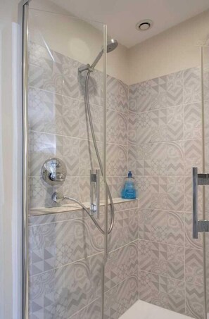 Eco-friendly toiletries, hair dryer, towels