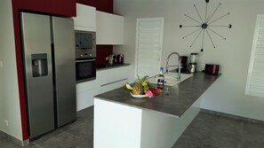 Fridge, microwave, oven, stovetop - Villa with pool in residence on the Hauts de St François (Saint-François)
